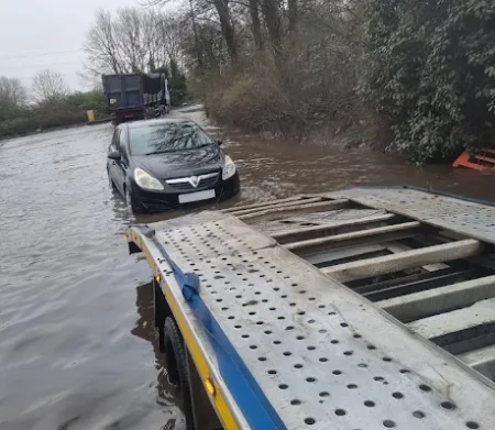 Richards Recoveries and Rescue - Car rescued from flooded road.